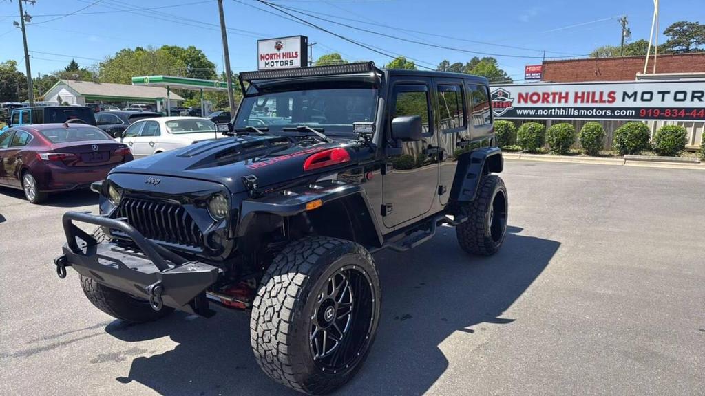 used 2014 Jeep Wrangler Unlimited car, priced at $18,499