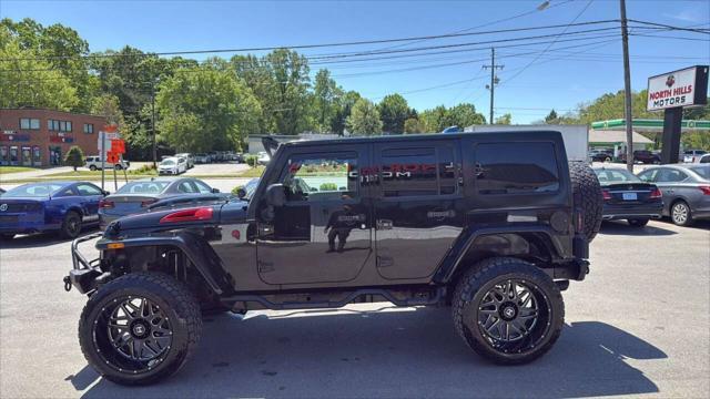used 2014 Jeep Wrangler Unlimited car, priced at $23,999