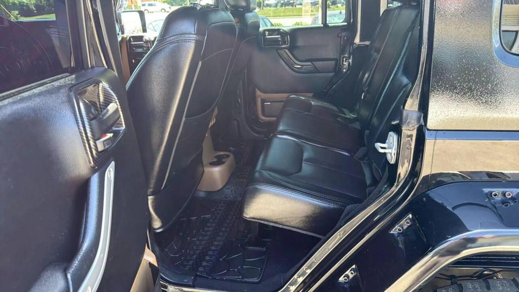 used 2014 Jeep Wrangler Unlimited car, priced at $18,499