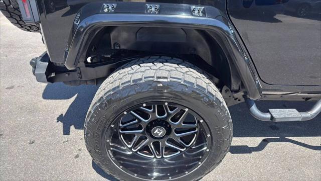 used 2014 Jeep Wrangler Unlimited car, priced at $23,999