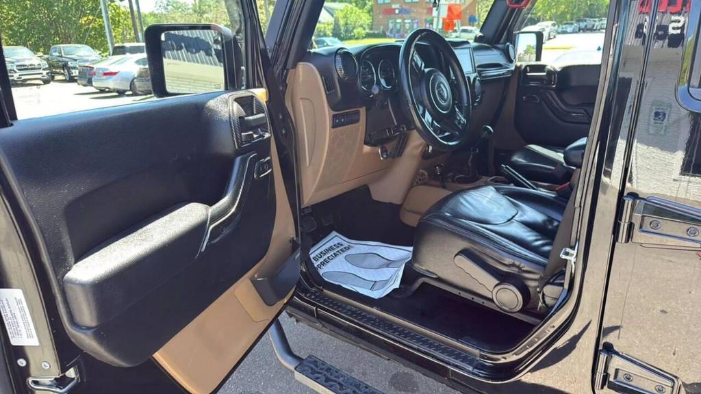 used 2014 Jeep Wrangler Unlimited car, priced at $18,499