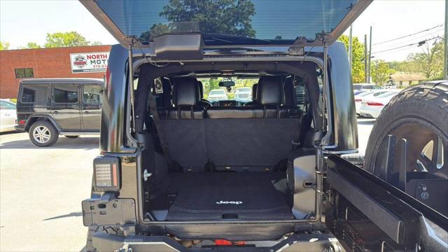 used 2014 Jeep Wrangler Unlimited car, priced at $23,999