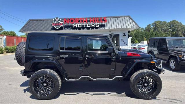 used 2014 Jeep Wrangler Unlimited car, priced at $23,999