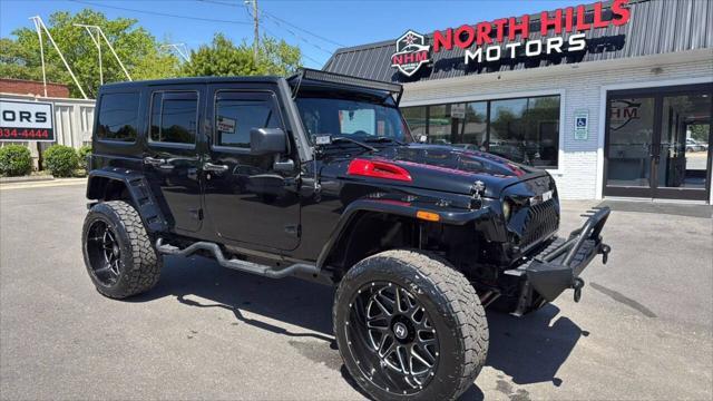 used 2014 Jeep Wrangler Unlimited car, priced at $23,999