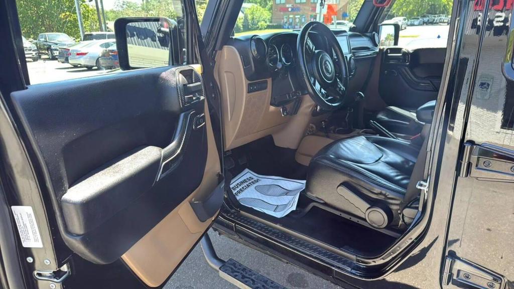 used 2014 Jeep Wrangler Unlimited car, priced at $18,499