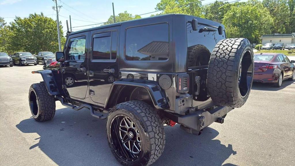used 2014 Jeep Wrangler Unlimited car, priced at $18,499