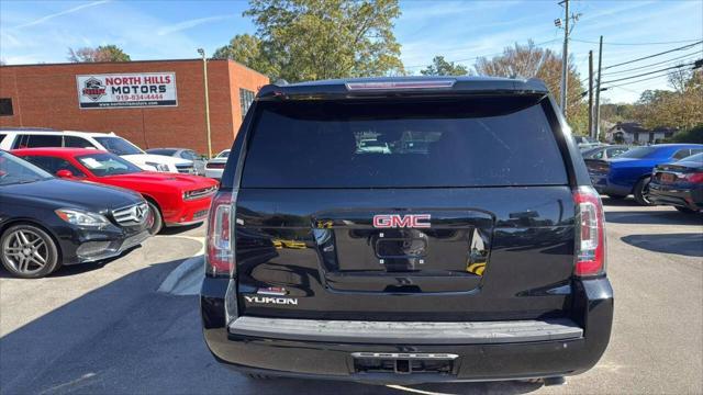 used 2015 GMC Yukon car, priced at $20,987