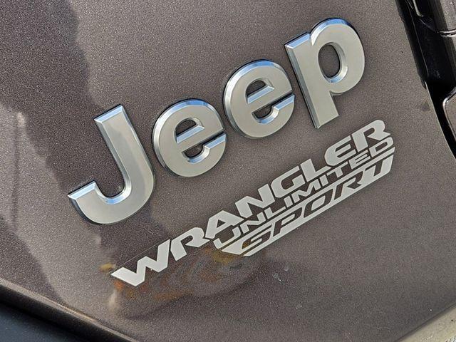 used 2021 Jeep Wrangler Unlimited car, priced at $27,991