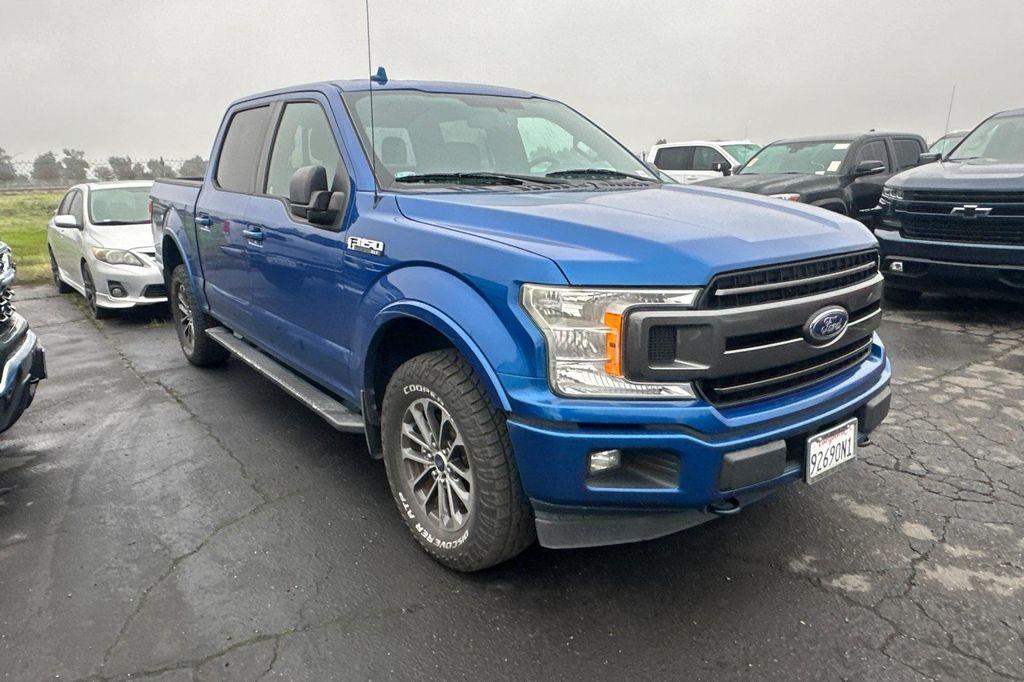 used 2018 Ford F-150 car, priced at $22,991