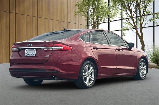 used 2018 Ford Fusion car, priced at $14,699