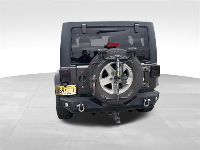 used 2014 Jeep Wrangler Unlimited car, priced at $14,900