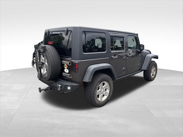 used 2014 Jeep Wrangler Unlimited car, priced at $14,900