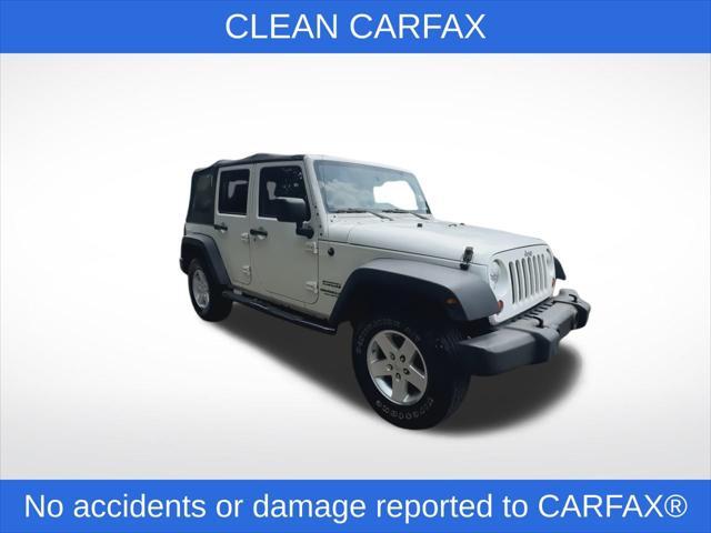 used 2010 Jeep Wrangler Unlimited car, priced at $11,055