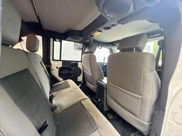 used 2010 Jeep Wrangler Unlimited car, priced at $11,055