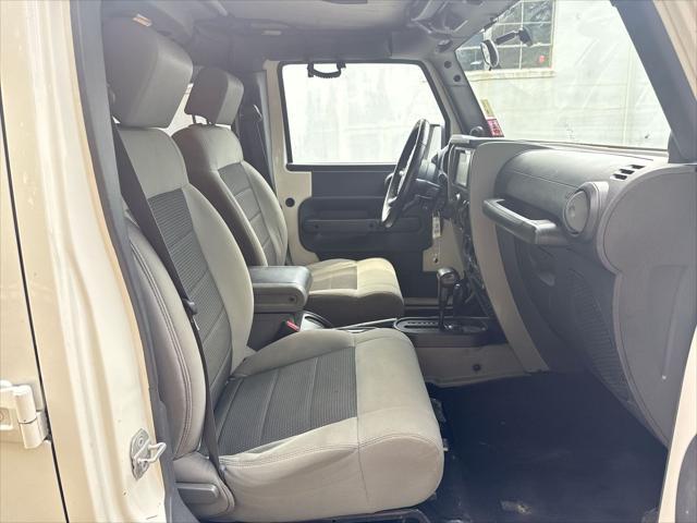 used 2010 Jeep Wrangler Unlimited car, priced at $11,055