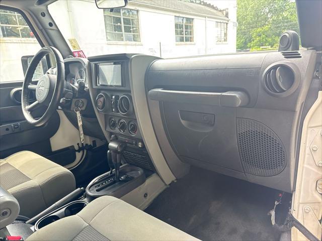 used 2010 Jeep Wrangler Unlimited car, priced at $11,055