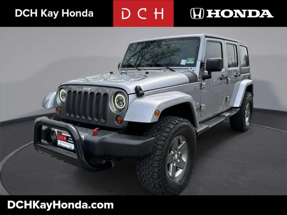 used 2013 Jeep Wrangler Unlimited car, priced at $18,499