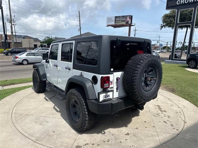 used 2015 Jeep Wrangler Unlimited car, priced at $21,995