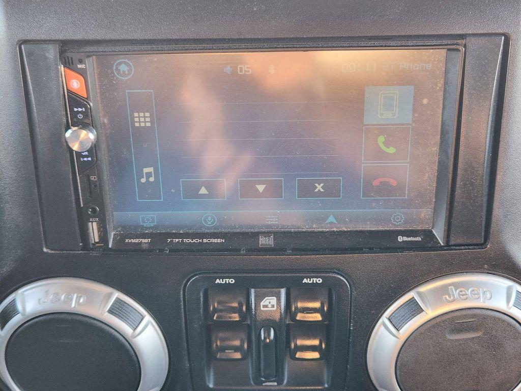 used 2015 Jeep Wrangler Unlimited car, priced at $17,337