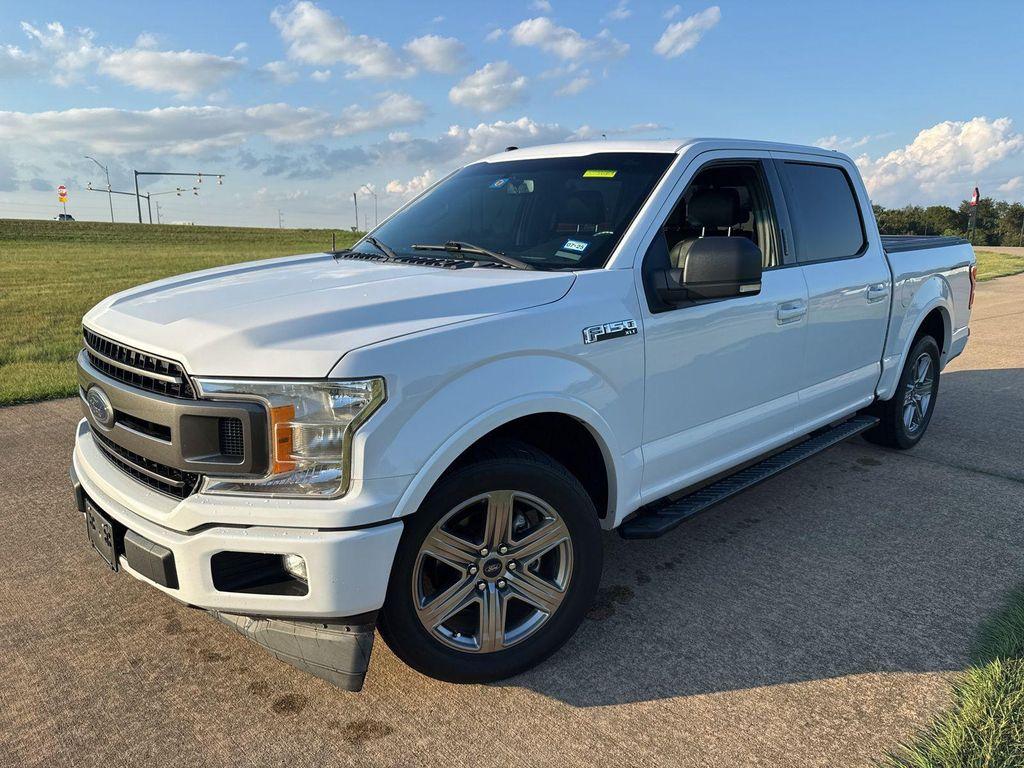 used 2018 Ford F-150 car, priced at $19,299