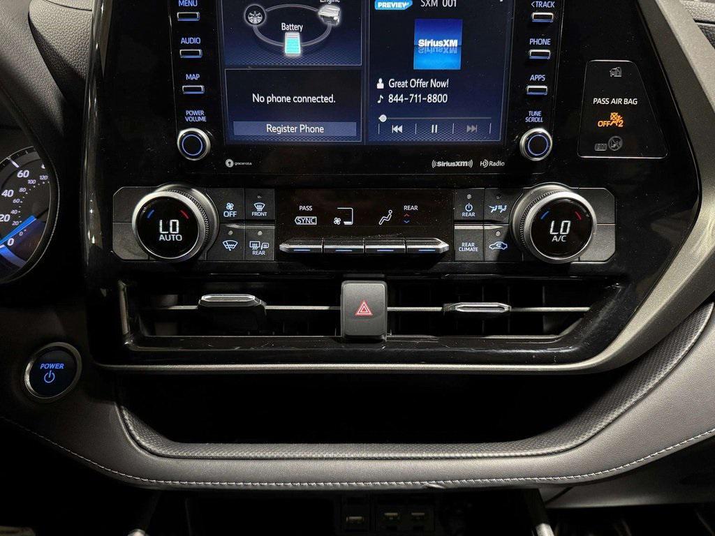 used 2021 Toyota Highlander Hybrid car, priced at $29,987