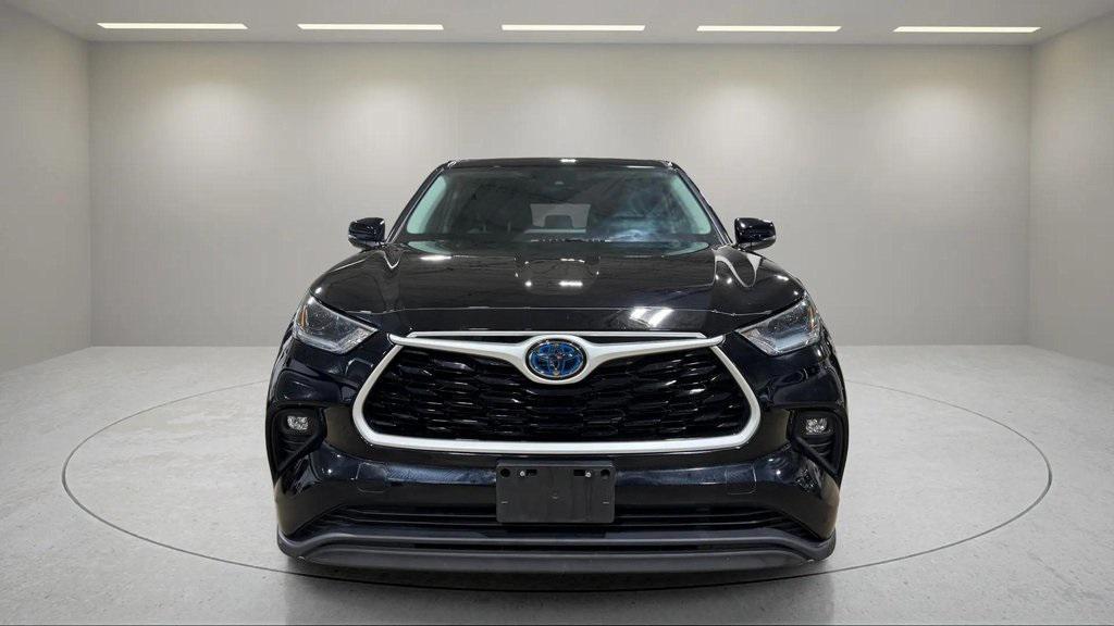 used 2021 Toyota Highlander Hybrid car, priced at $29,987