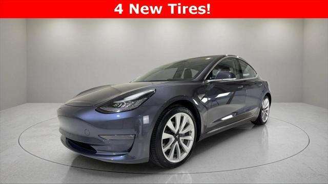 used 2018 Tesla Model 3 car, priced at $27,495