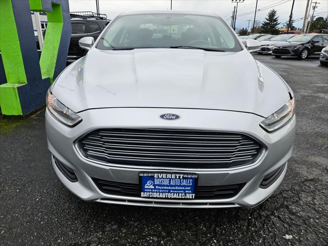 used 2014 Ford Fusion car, priced at $6,999