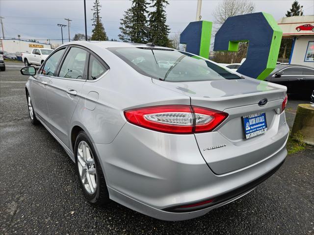 used 2014 Ford Fusion car, priced at $6,999