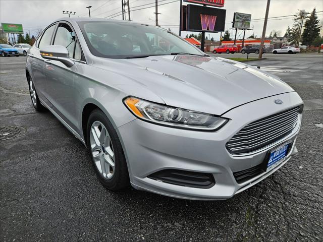 used 2014 Ford Fusion car, priced at $6,999