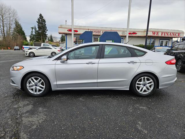 used 2014 Ford Fusion car, priced at $6,999