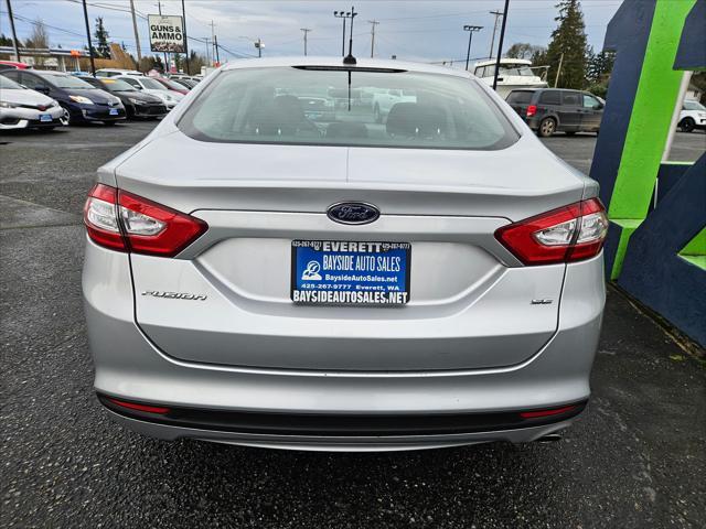 used 2014 Ford Fusion car, priced at $6,999