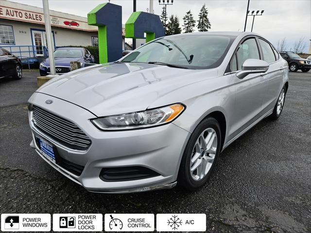 used 2014 Ford Fusion car, priced at $6,999