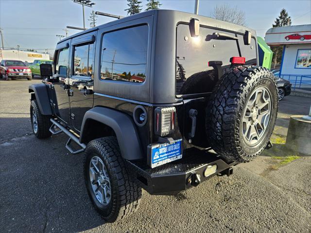 used 2014 Jeep Wrangler Unlimited car, priced at $14,999