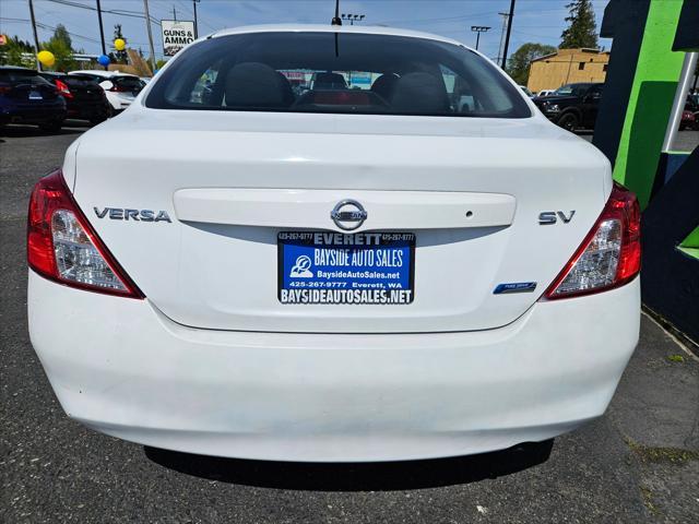 used 2012 Nissan Versa car, priced at $5,999