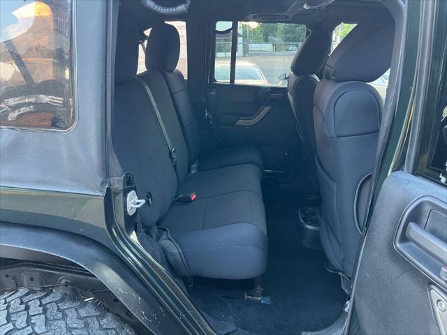 used 2011 Jeep Wrangler Unlimited car, priced at $9,999