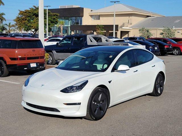 used 2022 Tesla Model 3 car, priced at $26,979