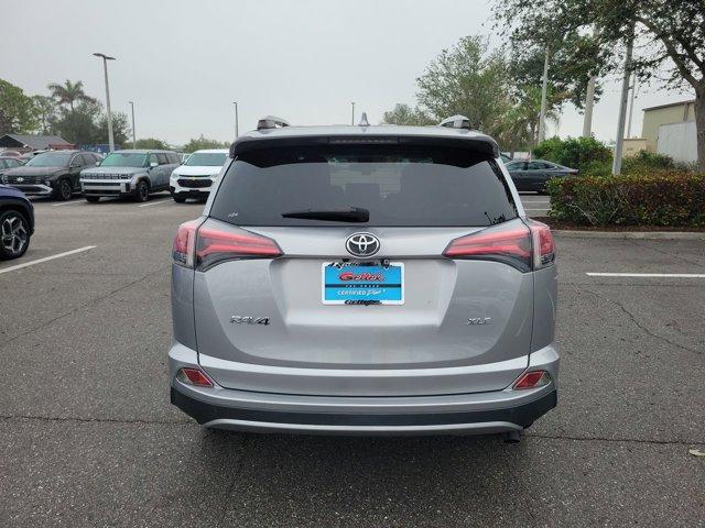 used 2018 Toyota RAV4 car, priced at $17,556