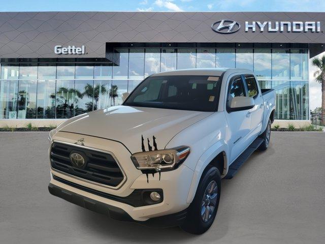 used 2018 Toyota Tacoma car, priced at $21,575