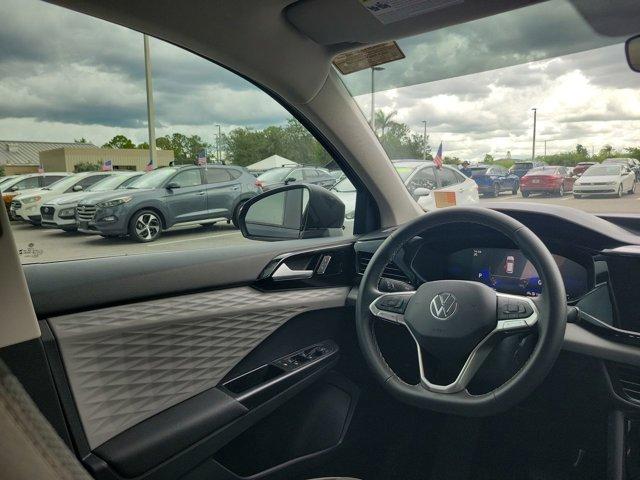 used 2023 Volkswagen Taos car, priced at $19,191