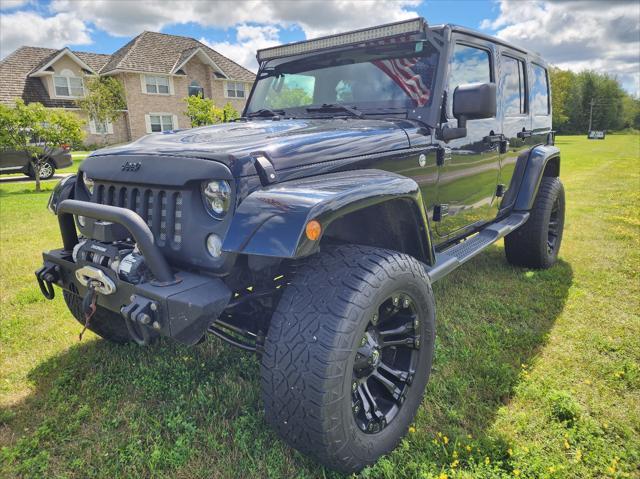 used 2016 Jeep Wrangler Unlimited car, priced at $21,950