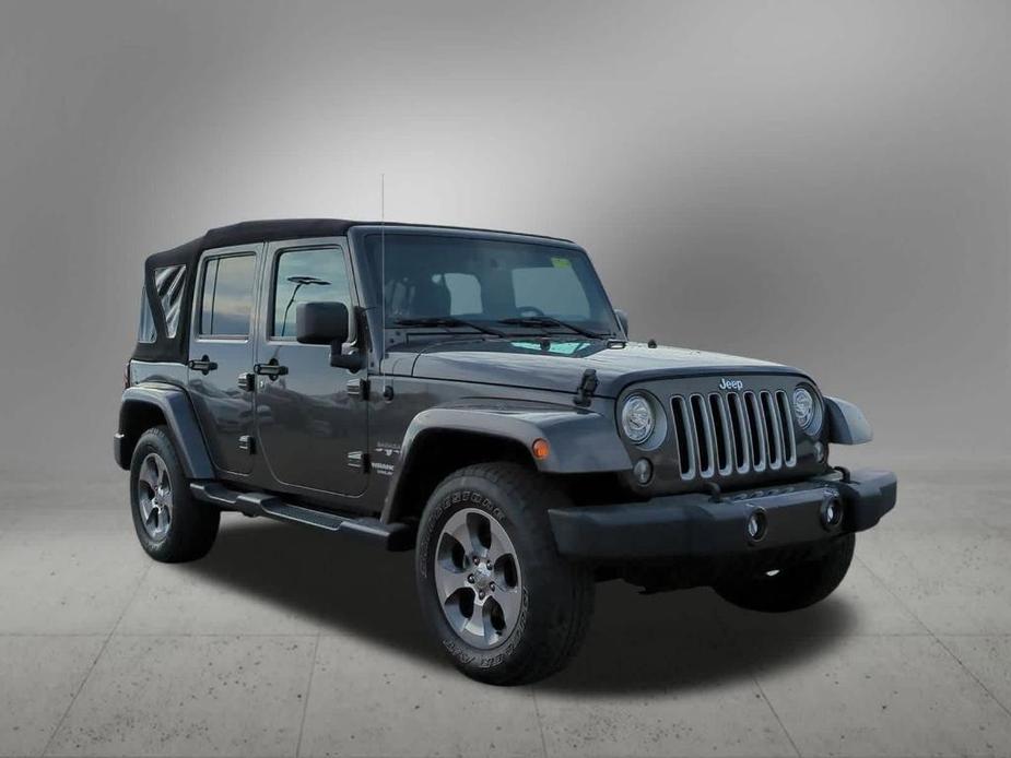 used 2017 Jeep Wrangler Unlimited car, priced at $22,378