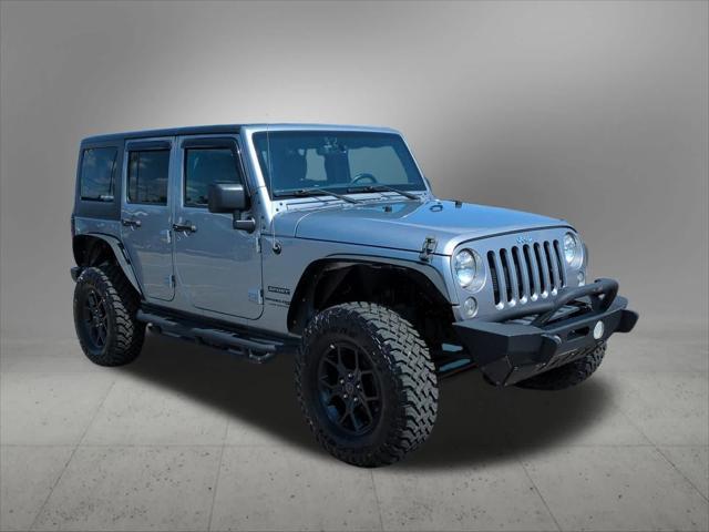 used 2018 Jeep Wrangler JK Unlimited car, priced at $22,930