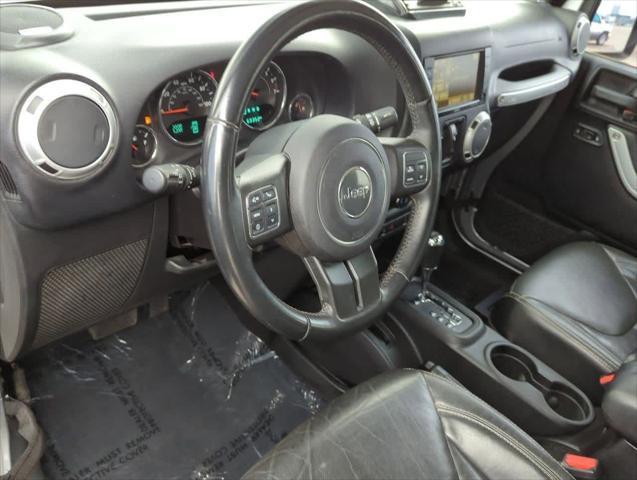 used 2016 Jeep Wrangler Unlimited car, priced at $21,439