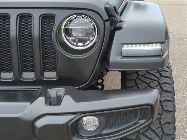 used 2021 Jeep Wrangler Unlimited car, priced at $42,930