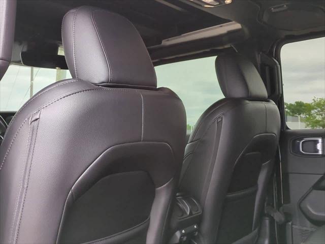 used 2021 Jeep Wrangler Unlimited car, priced at $42,930
