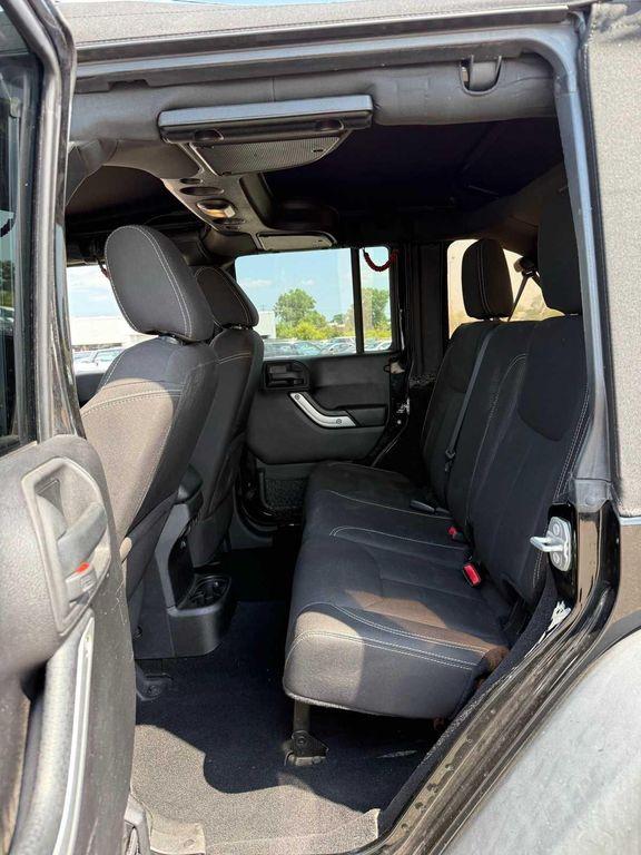 used 2015 Jeep Wrangler Unlimited car, priced at $22,351
