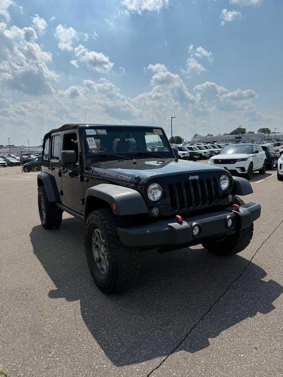 used 2015 Jeep Wrangler Unlimited car, priced at $22,351