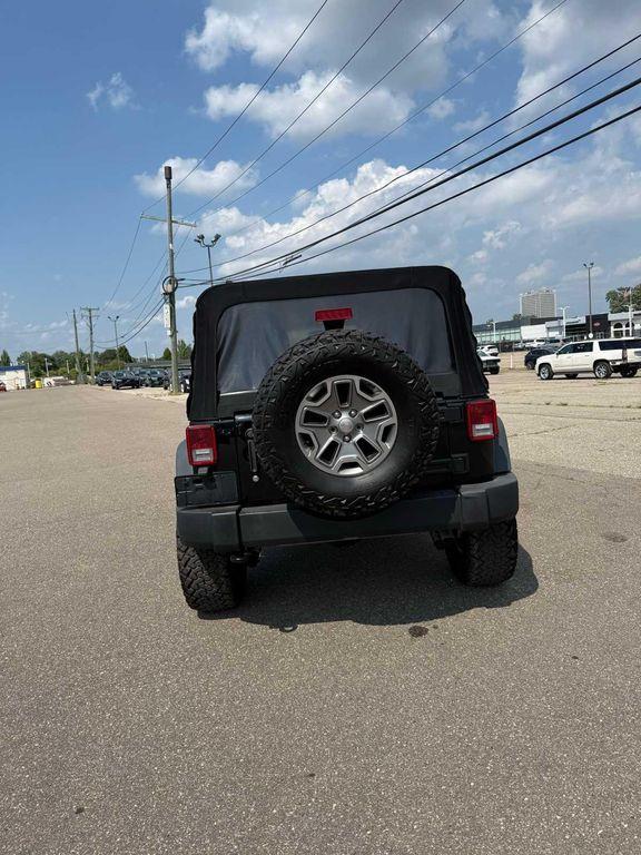 used 2015 Jeep Wrangler Unlimited car, priced at $22,351