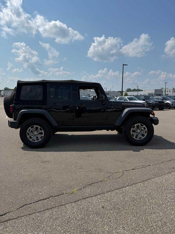 used 2015 Jeep Wrangler Unlimited car, priced at $22,351